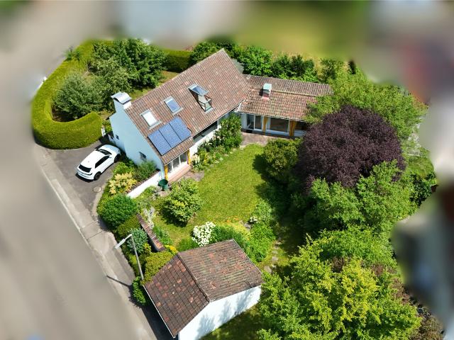 Bungalowstil in begehrter Lage trifft auf besondere Architektur!