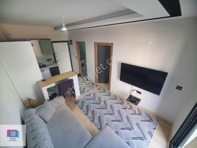 Buca Adatepe'de Eşyalı Yerden Isıtmalı Satılık 1+1 Daire