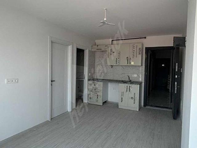 Buca Çamlıkule Mahallesinde Kiralık 1+1 Arakat Sıfır Daire