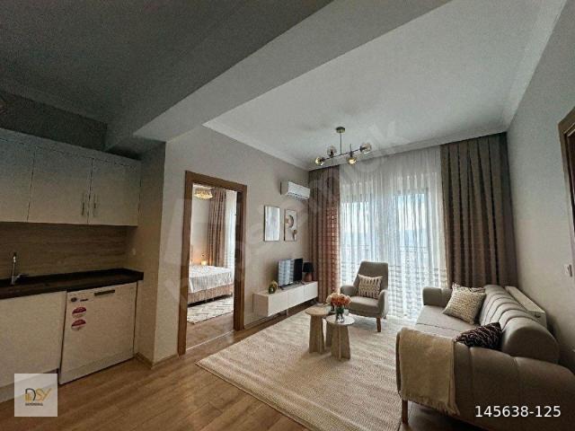 BUCADA SİTE İÇİ 2+1 FULL EŞYALI D.GAZLI KLİMALI ARA KAT A.HAVUZLU DAİRE