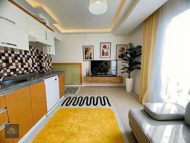BUCA'NIN KALBİNDE 1+1 SIFIR EŞYALI ARAKATTA SATILIK DAİRE