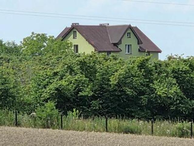 Budynek mieszkalny wielofunkcyjny na 2 ha działce
