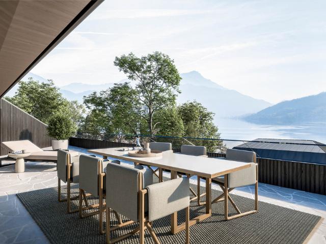 Bühne frei für See, Sonne und Berge! Terrassenwohnung in Steinbach am Attersee mit privatem Seezugang