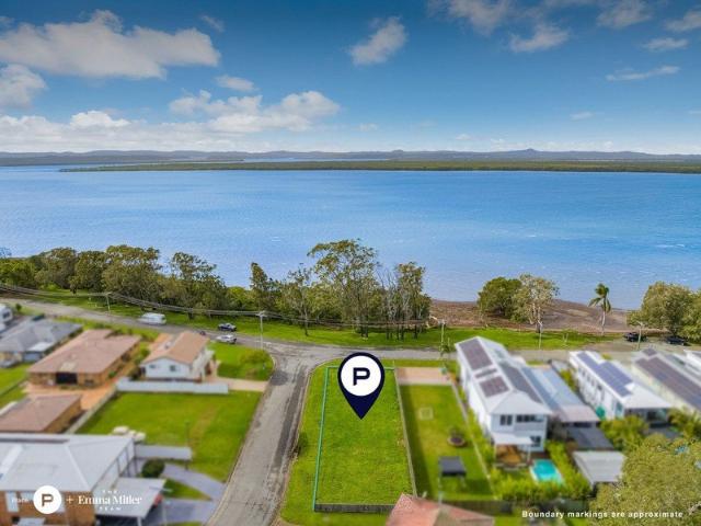 Build Your Bayside Dream on a Prime Corner Waterfront Allotment