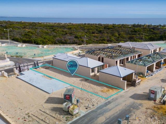 Build your coastal dream walking distance to Golden Bay beach