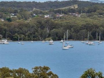 Build Your Dream at Exclusive Fishing Point: Custom Plans Included or Design Your Own