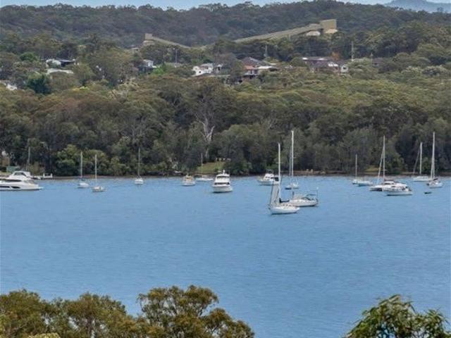 Build Your Dream at Exclusive Fishing Point: Custom Plans Included or Design Your Own