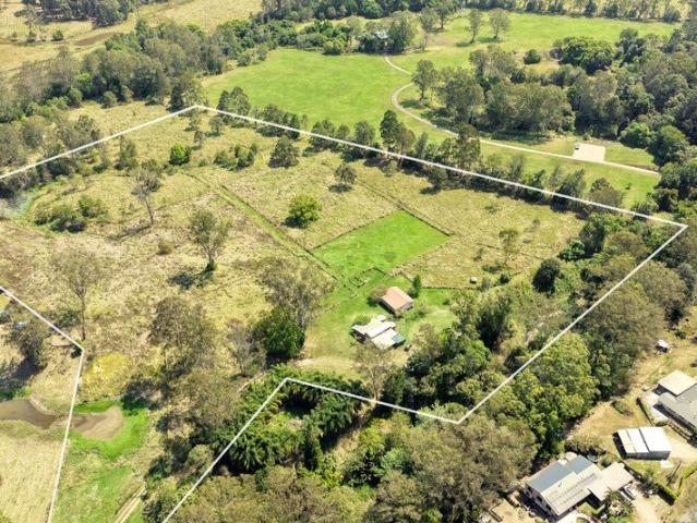 Build Your Dream Home Enjoy your hobby farm and experience over 15 acres of serenity
