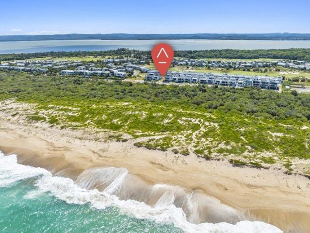 Build your dream home in a sought after complex, beach views!