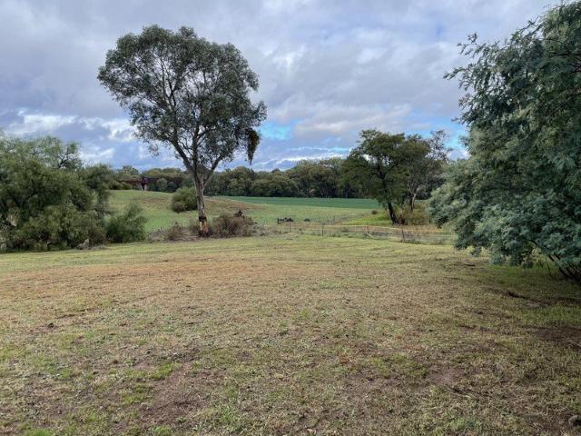 BUILD YOUR DREAM HOME ON THIS BLOCK CLOSE TO TOWN
