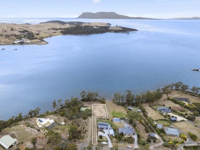 Build your dream retreat by the bay