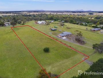 A SPACIOUS 2.47 ACRE PARCEL OF LAND OFFERING ENDLESS POTENTIAL
