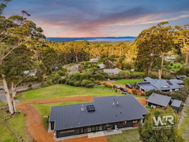 BUILDER'S MASTERPIECE WITH PANORAMIC WILSON INLET VIEWS, FLEXIBLE LUXURY LIVING & SEPARATE FREESTANDING SELF CONTAINED STUDIO