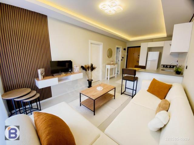 BULUT EMLAK DENİZ MANZARALI SIFIR EŞYALI FERAH SATILIK1+1 DAİRE