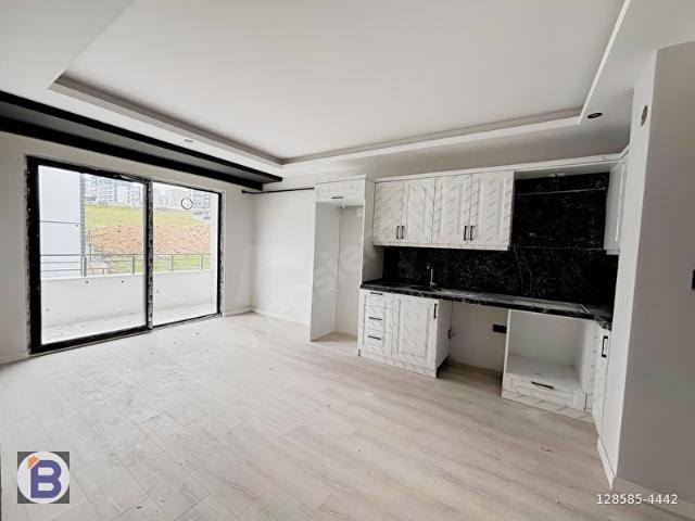 BULUT EMLAK  DEPOZİTOSUZ DOLMUŞ OTOBÜS YANINDA 1+1 DAİRE