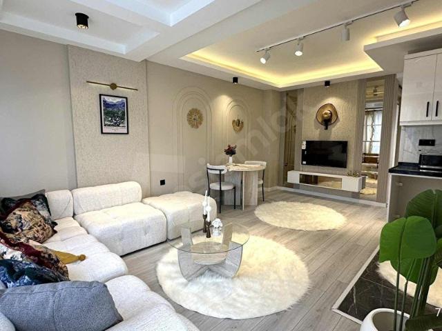 BULUT EMLAK FULL EŞYALI ÇİFT BALKON GENİŞ TRAMVAY 45DK 1+1