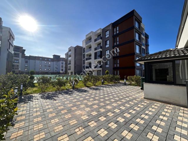 Burhaniye Bahçelievler Mahallesinde Bahçe Kullanımlı 2+1 Sıfır Daire