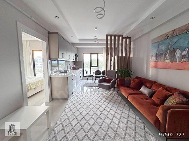 Burhaniye Bahçelievler'de Satılık Eşyalı 1+1 Daire