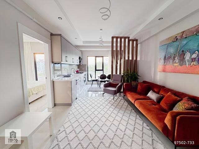 Burhaniye Bahçelievler'de Satılık Lüx Eşyalı 1+1 Daire