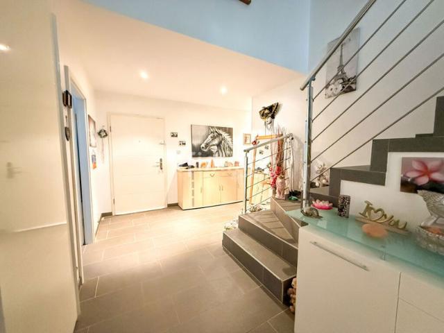 Buschwiller: Maison de Standing 255 m² avec Rentabilité Intég