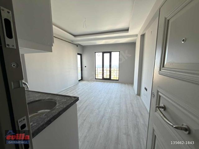BÜYÜKOYUMCA'DA DENİZ MANZARALI KİRALIK 1+1 DAİRE