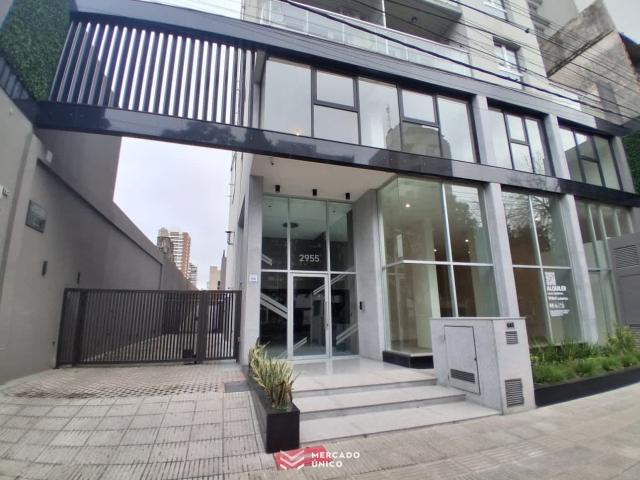 Bv. Pellegrini 2955 Piso 7 Departamento C Cochera N°5