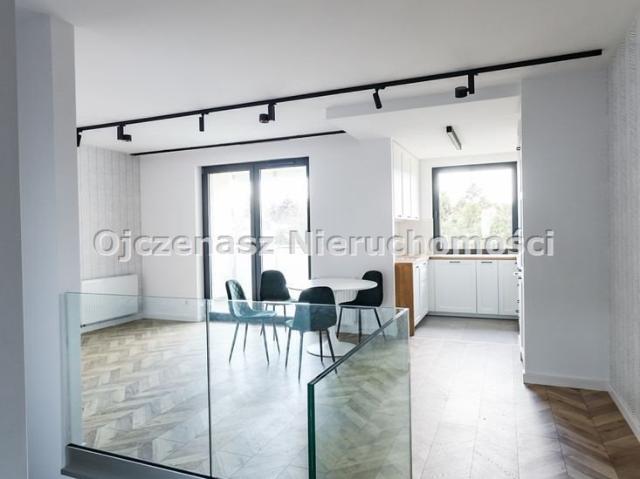 Sprzedam dwupoziomowe mieszkanie 98 m² z ogródkiem i garażem