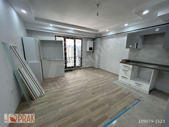 byTOPRAK'TAN Gökalp'de Merkezi Konumda Giriş Katta 1+1 Amerikan Mutfak Kiralık Daire