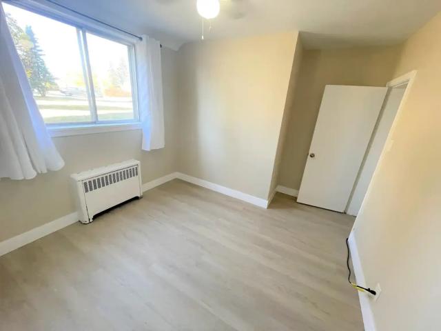 Cambridge Place — Modern 2 Bedroom 1 Bath Suite Heat & Water Included starting at $1225