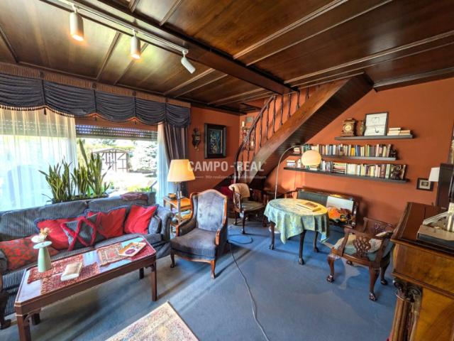 CAMPO HAUS: Familienvilla mit Schwimmbiotop