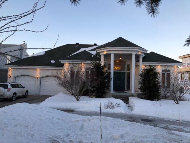 Candiac Quebec House for Rent on Boul Marie Victorin Incredible 4 Bedroom, 3 Bath with Indoor Pool and Large Terrace