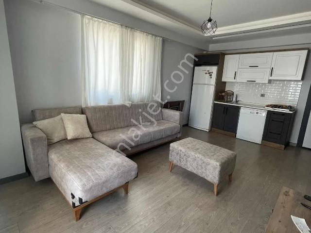Cadde~üstü~1+1~güvenlikli~sitede~full~eşyalı~merkezi~konum~
