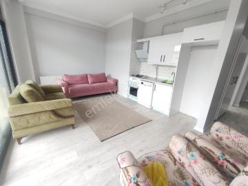 Cadde Üzeri Deniz Manzaralı Eşyalı Ayçadan Kiralık 1+1 Daire