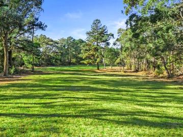 Captivating 5 Acre Parcel in Prestigious Enclave