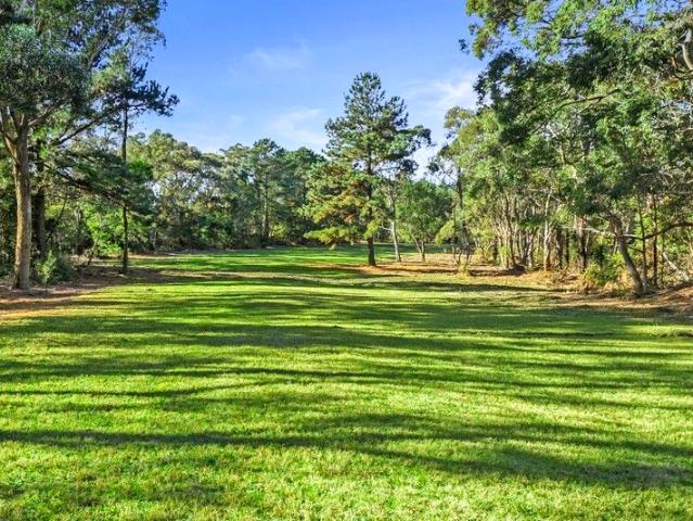 Captivating 5 Acre Parcel in Prestigious Enclave