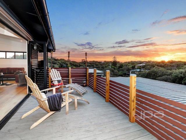 Captivating Sunset Views Across the Moonah Treetops