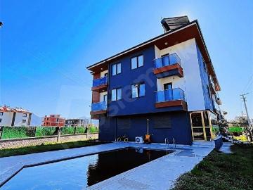 CARETTA VİLLA'DAN FIRSAT KARABURUN MAH HAVUZLU 1+1 SATILIK DAİRE