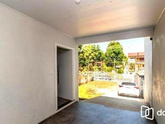 Casa no bairro Jardim Carvalho de 2 dormitórios e amplo pátio