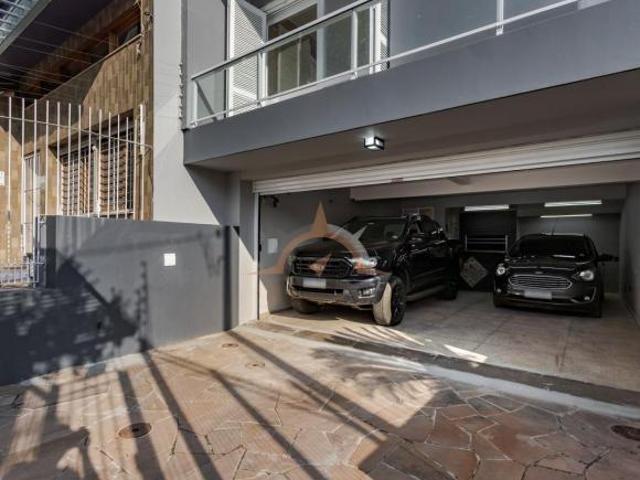 CASA NO BAIRRO JARDIM LINDÓIA COM 3 DORM. LIVING INTEGRADO LAREIRA E PISCINA
