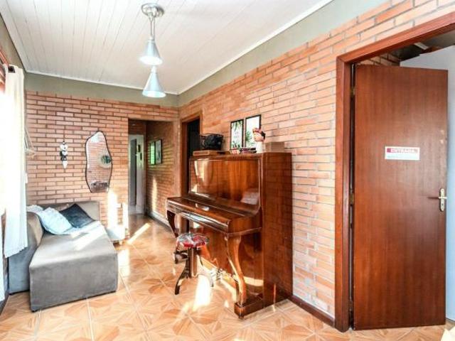 Casa no Jardim Botânico de 2 dormitórios 1 vaga e amplo terreno