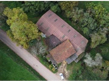 Casa a reformar con nave y terrenos