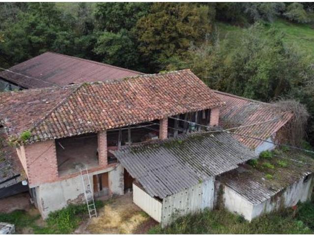 Casa a reformar con nave y terrenos