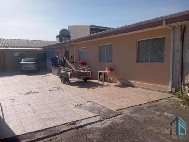 Casa a venda c/ loja no mesmo terreno a venda no Uberaba em Curitiba Pr