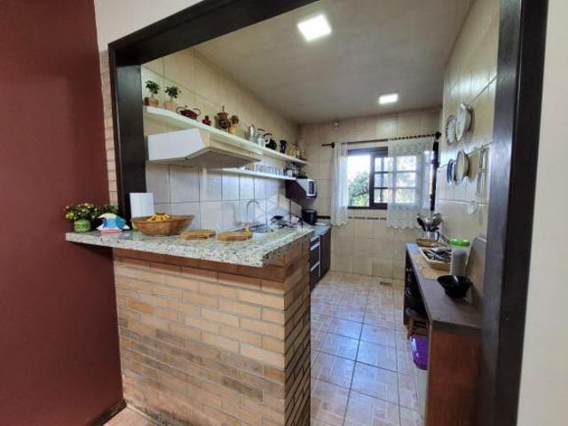 Casa à venda com 2 dormitórios, piscina, semi mobiliada em Balneário Marambaia, Arroio do Sal, RS