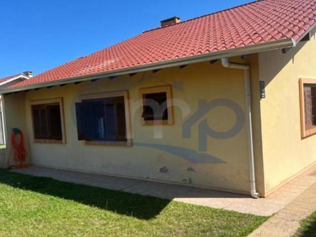 Casa a venda com 3 dormitorios na Praia Paraiso em Torres/RS