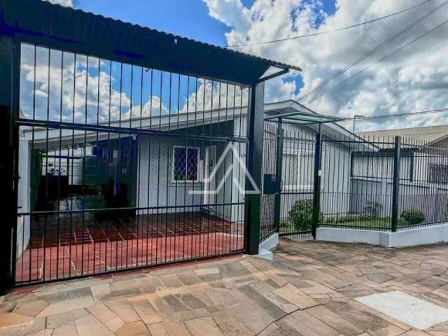 CASA A VENDA COM 4 DORMITÓRIOS + 02 APARTAMENTOS COM 2 DORMITÓRIOS + SALÃO DE FESTAS NO BAIRRO BOQU
