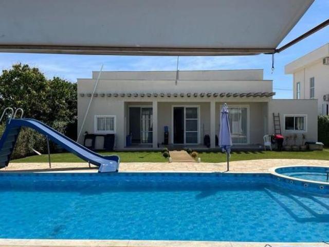 Casa à venda com 4 dormitórios com 363,96m² de área construída no Condominio Portal dos Lagos