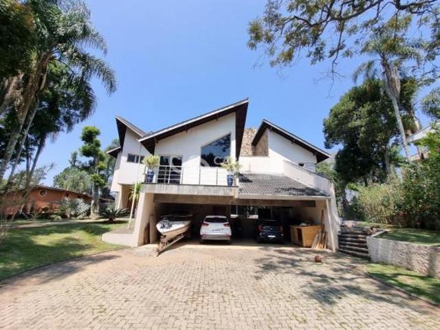CASA À VENDA EM CONDOMÍNIO FECHADO COM 600m², PISCINA AQUECIDA, 4 SUÍTES, ALTO PADRÃO, 10 VAGAS DE G