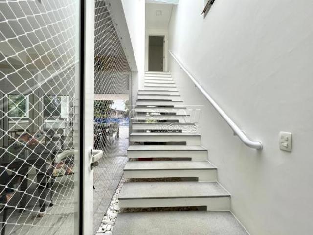 Casa à venda em condomínio, frente ao mar, com 4 dormitórios, espaço gourmet e piscina, na praia do