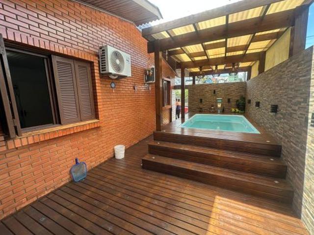 Casa à venda em Caxias do Sul, Jardim Eldorado 03 dormitórios Com piscina, ar condicionado, chu